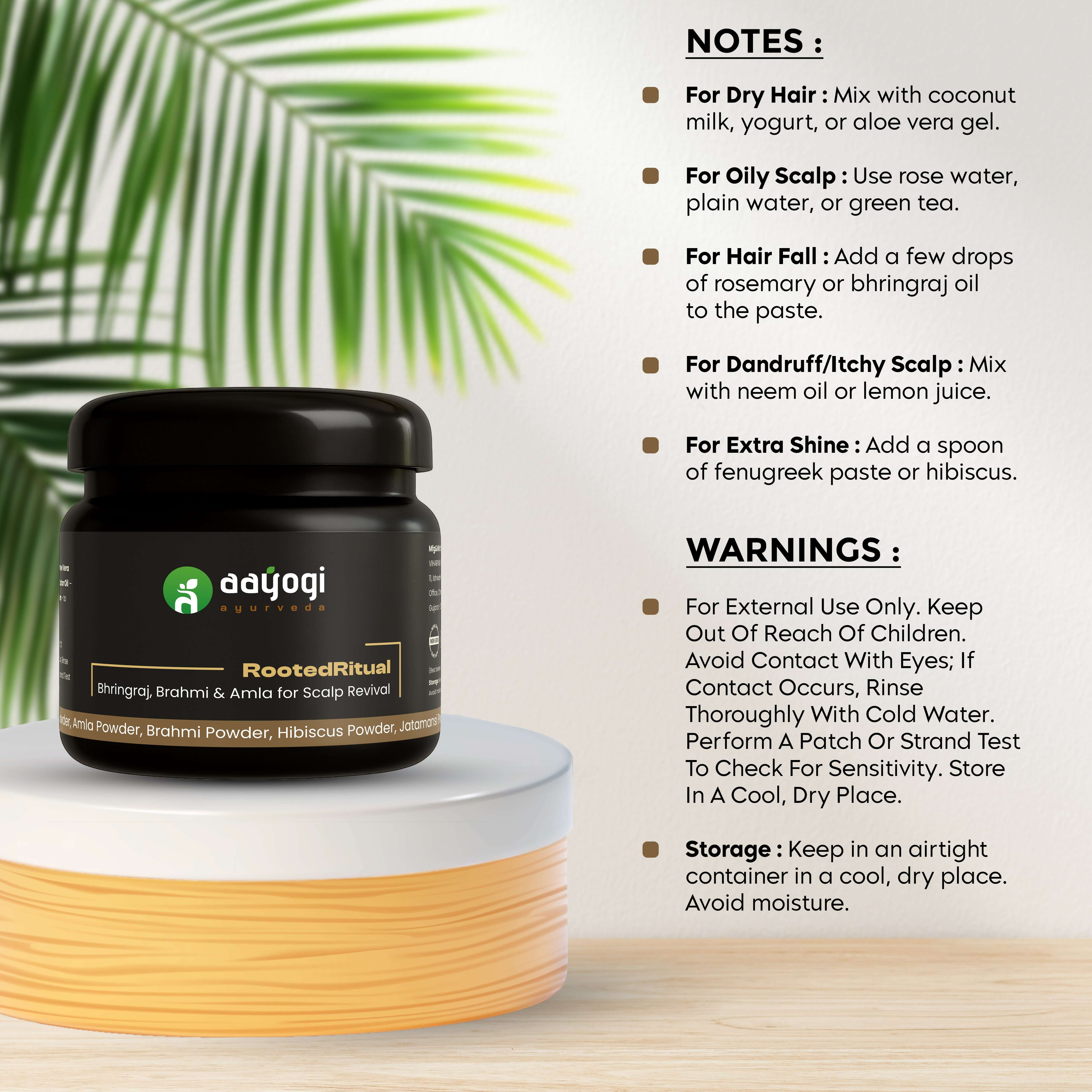 Aayogi Ayurveda Rooted Ritual Hair & Scalp Mask jar with usage and storage instructions on a table next to a plant.