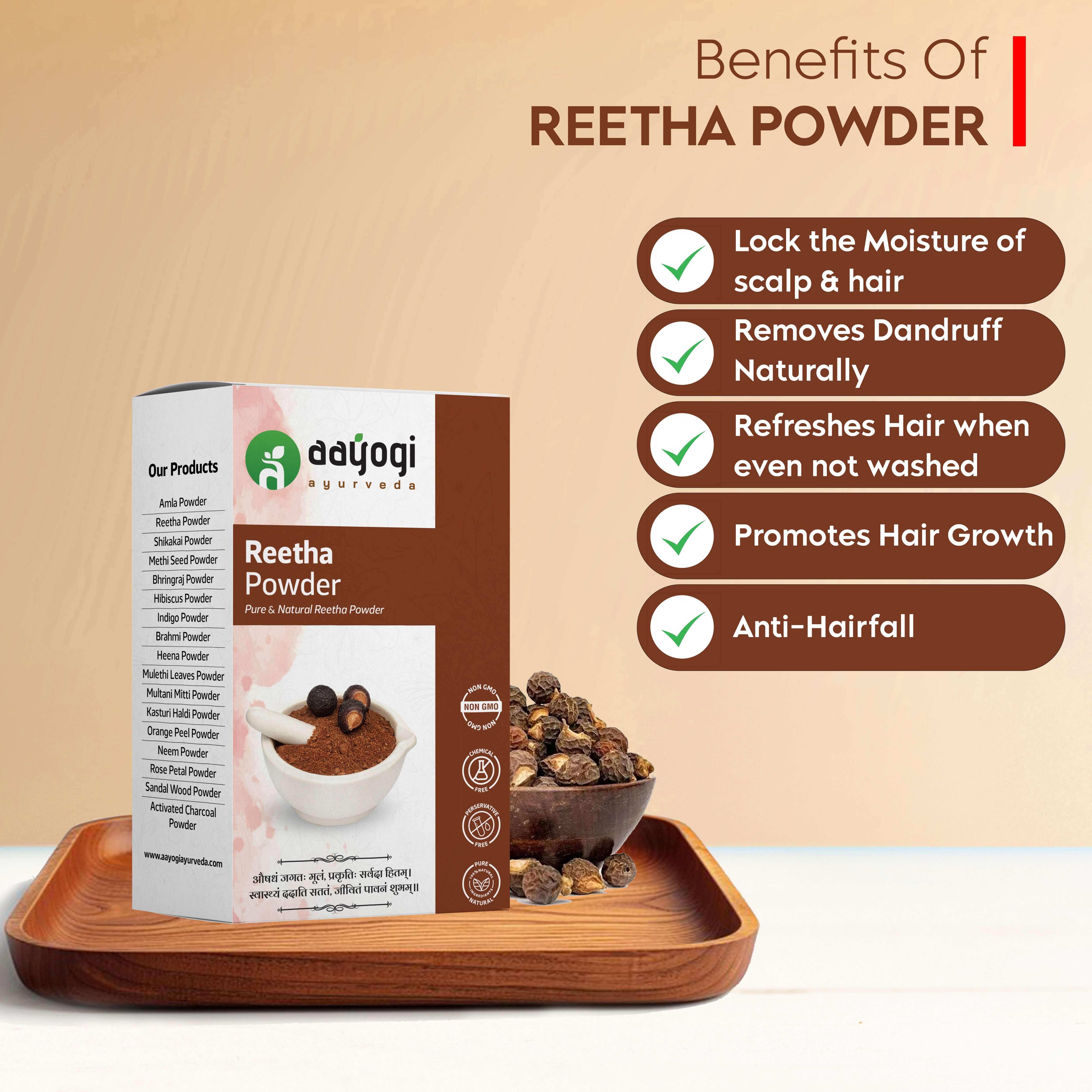 Reetha Powder benefits for hair growth, dandruff removal, and moisture locking, displayed on a wooden tray with packaging and dried fruit.